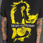 Black t-shirt with yellow graphic of Joan Jett and the Blackhearts on a dark background